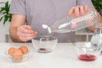 Coloring eggs with food coloring and vinegar