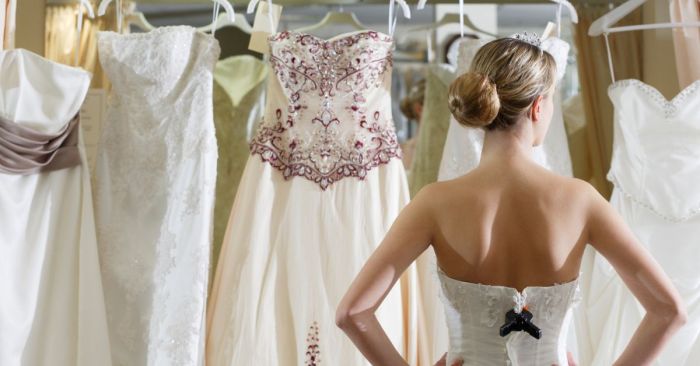 Groom seeing wedding dress